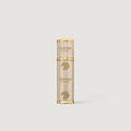 Creed gold leather 5ml perfume atomizer on a light gray background