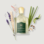 Bois du Portugal perfume bottle with botanical elements on a light background